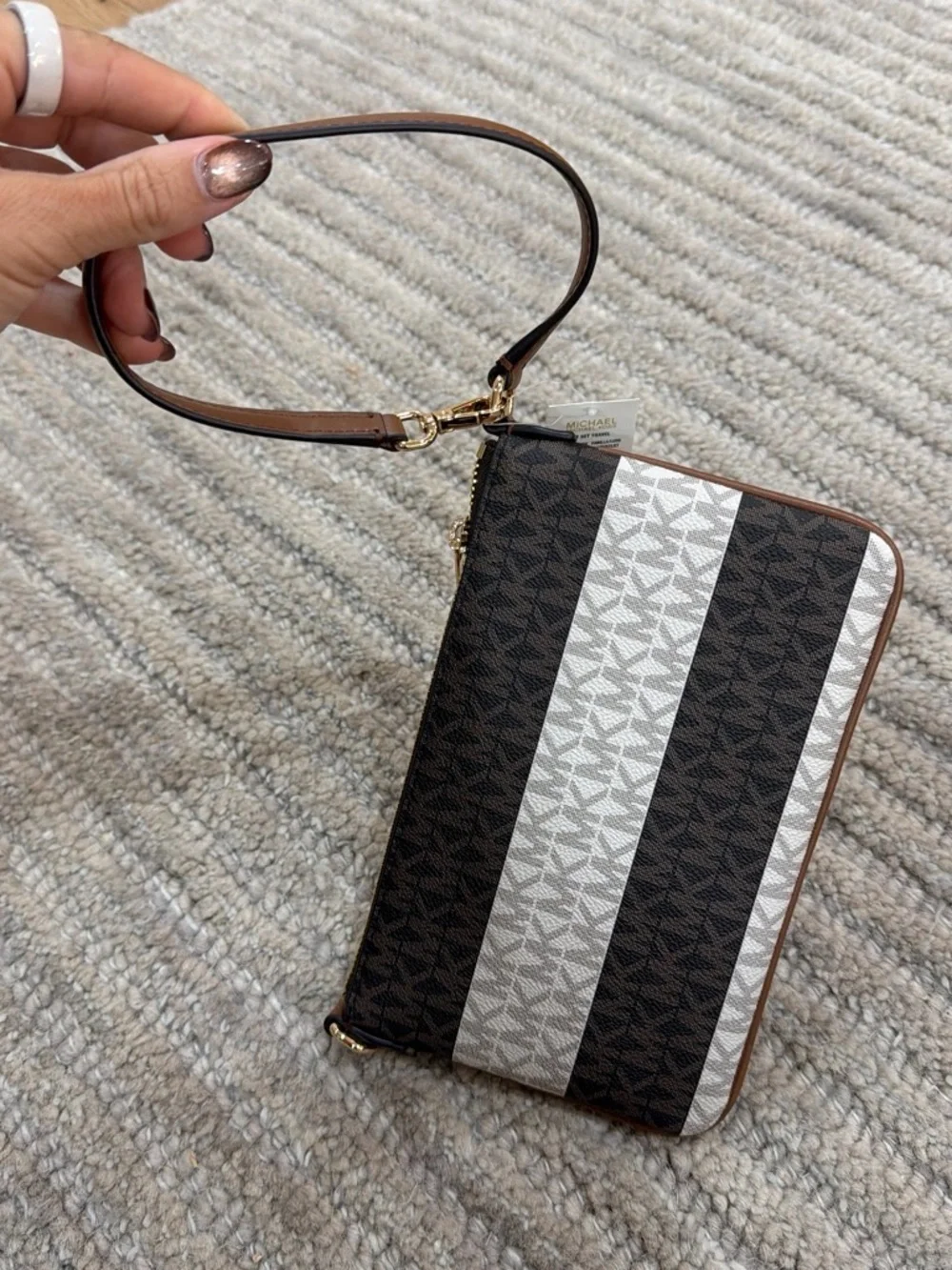 Michael Kors Brown and White MK Signature Stripe Wristlet